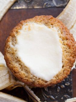 The Ultimate Best Banana Muffin. Light, fluffy and cake-like banana muffin with a cream cheese meringue baked on top. My favorite banana baked good.