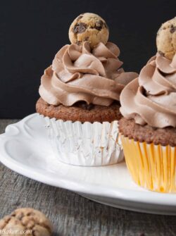CHOCOLATE CHIP COOKIE CUPCAKES. A soft, moist and flavorful cookie butter cupcake topped with a chocolate cookie frosting. The ultimate chocolate chip cookie lover's dream!