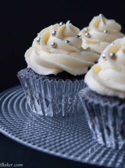DARK CHOCOLATE CUPCAKES WITH WHITE CHOCOLATE BUTTERCREAM. A light and fluffy, bold dark chocolate cupcake with a creamy luscious white chocolate buttercream.