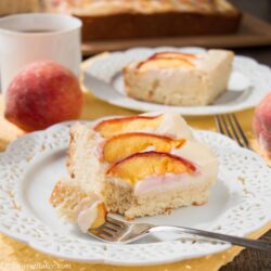 PEACHES AND CREAM COFFEE CAKE. A delicious sour cream coffee cake, topped with a velvety cream cheese mousse and juicy fresh peaches. Melt-in-your-mouth good!