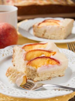 PEACHES AND CREAM COFFEE CAKE. A delicious sour cream coffee cake, topped with a velvety cream cheese mousse and juicy fresh peaches. Melt-in-your-mouth good!
