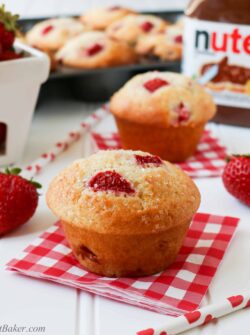 NUTELLA STUFFED STRAWBERRY MUFFINS. A delicious, soft, moist and fluffy muffin, loaded with fresh juicy strawberries and filled with Nutella inside! Quick and easy to make.