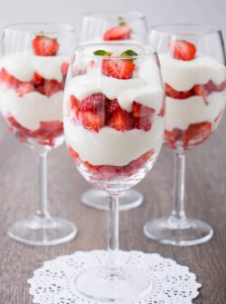 A velvety smooth white chocolate mousse paired with fresh ripe strawberries. Just 4 ingredients to make this simple and elegant dessert.