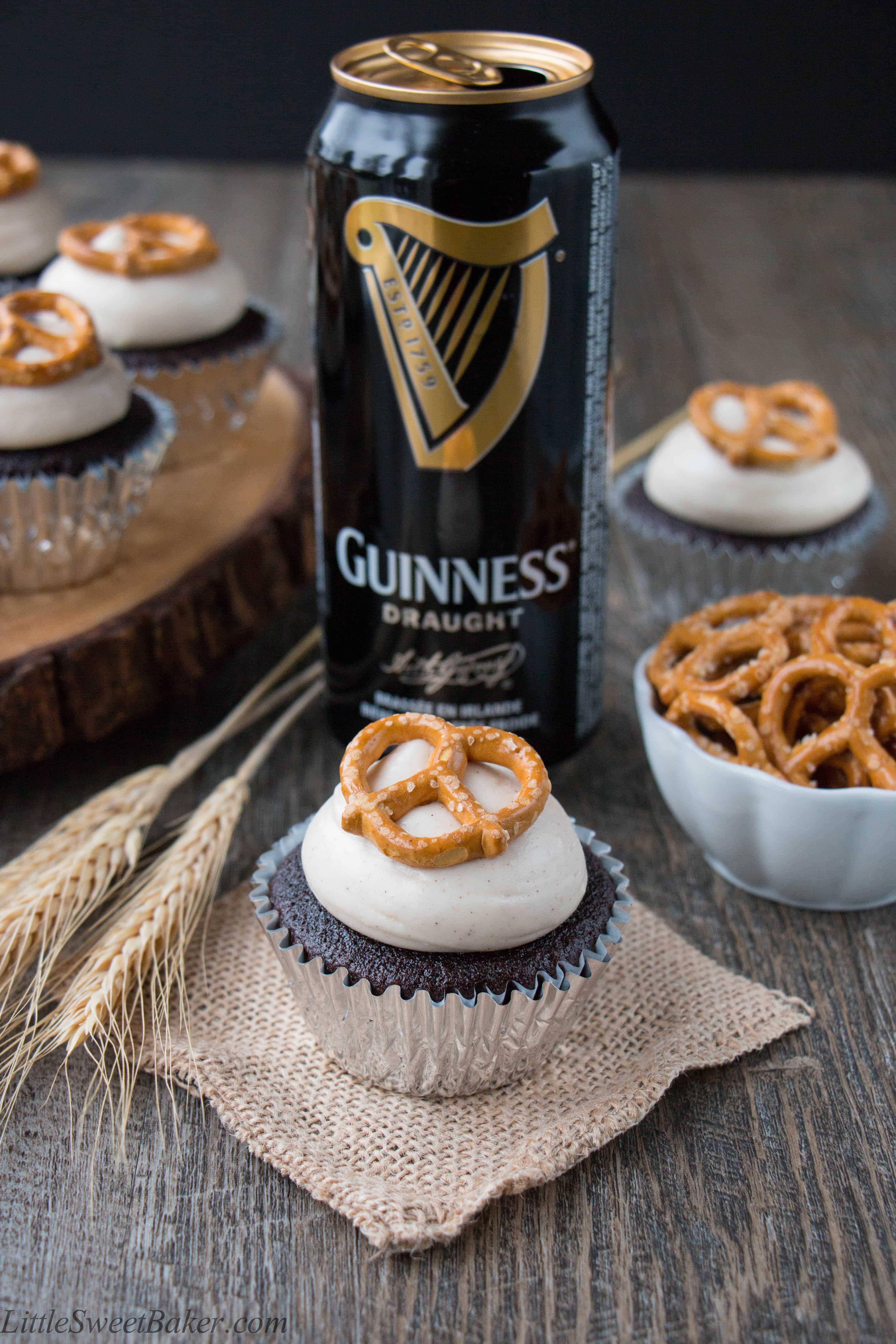 Guinness cupcake on a piece of burlap and a can of Guinness behind it.