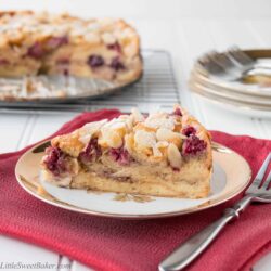 Buttery flaky croissants, ripe juicy berries and crunchy almonds all baked in a luscious custard makes this cake absolutely irresistible.