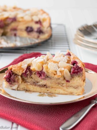 Buttery flaky croissants, ripe juicy berries and crunchy almonds all baked in a luscious custard makes this cake absolutely irresistible.