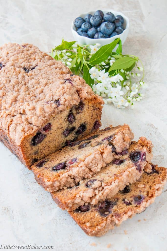 This is a moist flavorful banana bread, studded with delicious blueberries, topped with a crunchy sweet cinnamon streusel, and made without eggs. (video recipe)