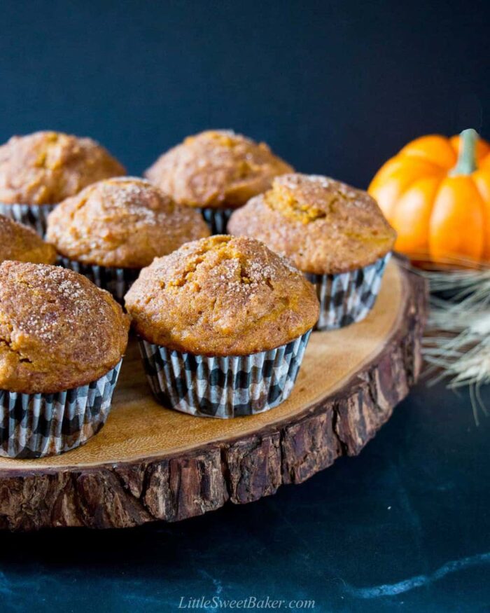 pumpkin muffins on a live edge wooden charger