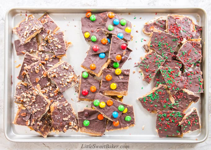 A baking sheet of 3 different types of Christmas Crack.