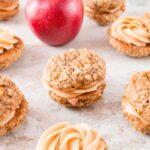 A creamy, sweet and salty peanut butter frosting sandwiched between two soft and chewy apple oatmeal cookies makes these whoopie pies absolutely irresistible.
