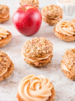 A creamy, sweet and salty peanut butter frosting sandwiched between two soft and chewy apple oatmeal cookies makes these whoopie pies absolutely irresistible.