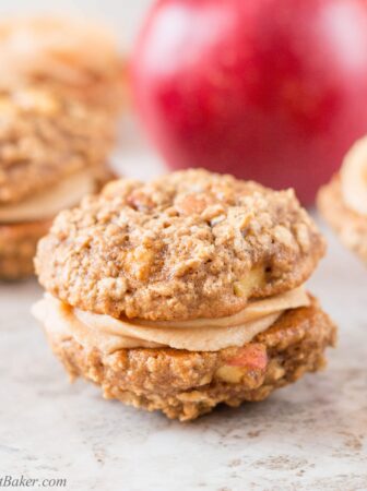 A creamy, sweet and salty peanut butter frosting sandwiched between two soft and chewy apple oatmeal cookies makes these whoopie pies absolutely irresistible.