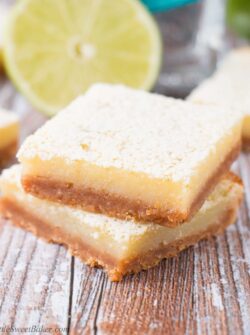 These zesty and sweet lime bars are to die for. They are bursting with a tangy lime taste and pack a punch of tequila flavor.