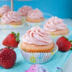 These moist and buttery vanilla cupcakes are soft pink in color and topped with a strawberry reduction buttercream. I made them for my best friend's baby shower and they were a hit!