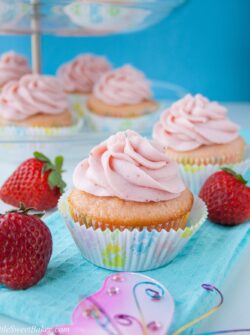 These moist and buttery vanilla cupcakes are soft pink in color and topped with a strawberry reduction buttercream. I made them for my best friend's baby shower and they were a hit!