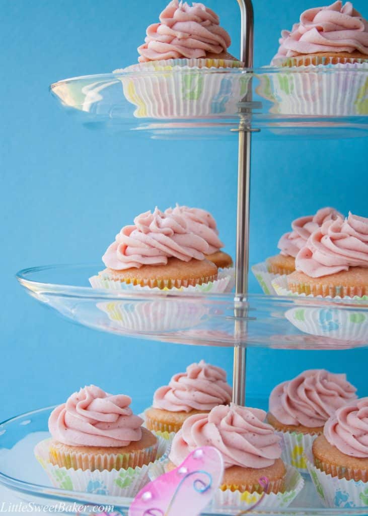 These moist and buttery vanilla cupcakes are soft pink in color and topped with a strawberry reduction buttercream. I made them for my best friend's baby shower and they were a hit!