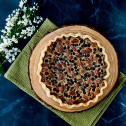 This recipe takes pecan pie and adds the intense flavor of bourbon and chocolate together in a sweet-gooey filling.