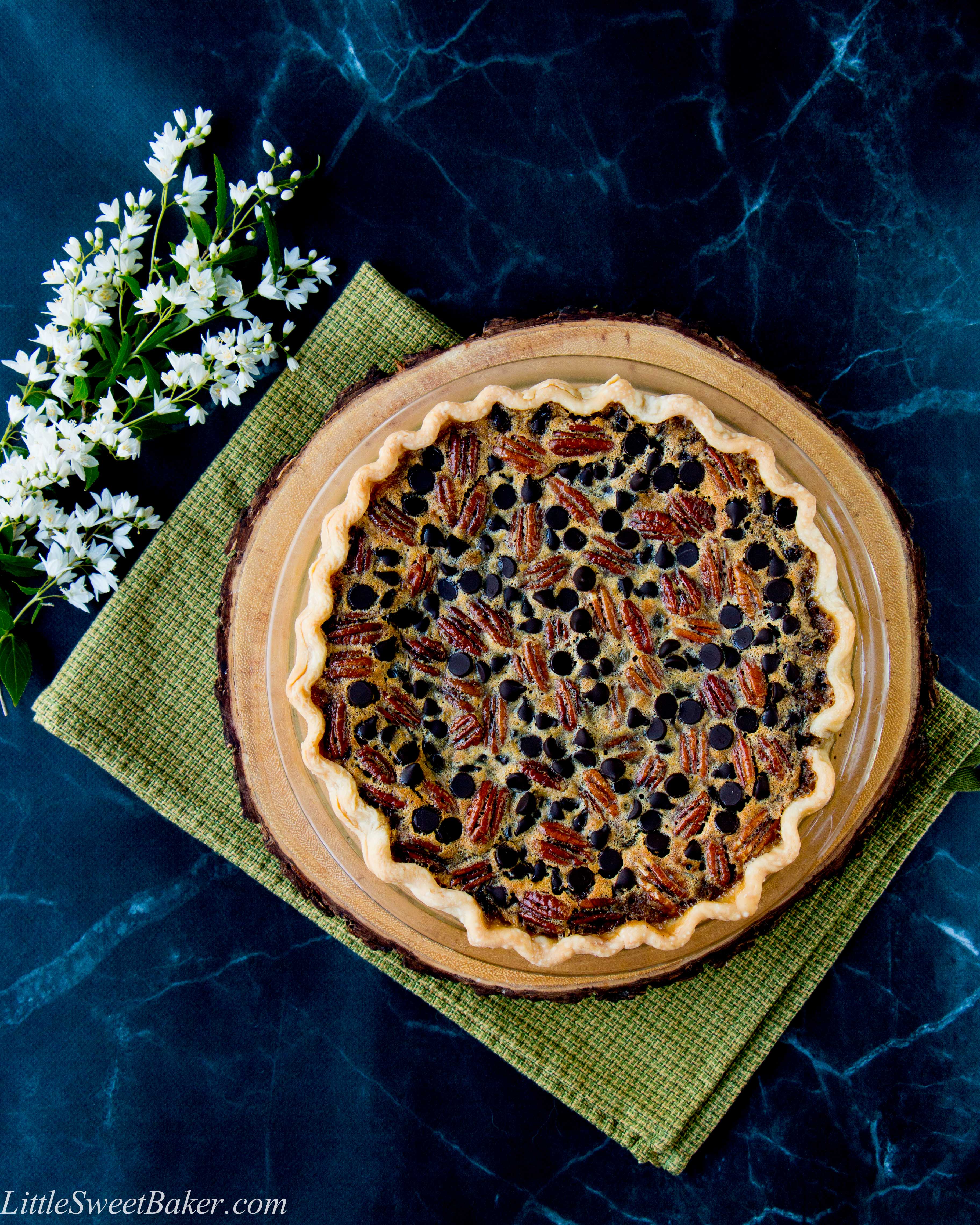 This recipe takes pecan pie and adds the intense flavor of bourbon and chocolate together in a sweet-gooey filling.