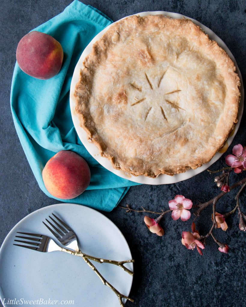 This easy peach pie has a rich-buttery pie crust and a simple peach filling. Use fresh or frozen peaches and enjoy this pie all year round.