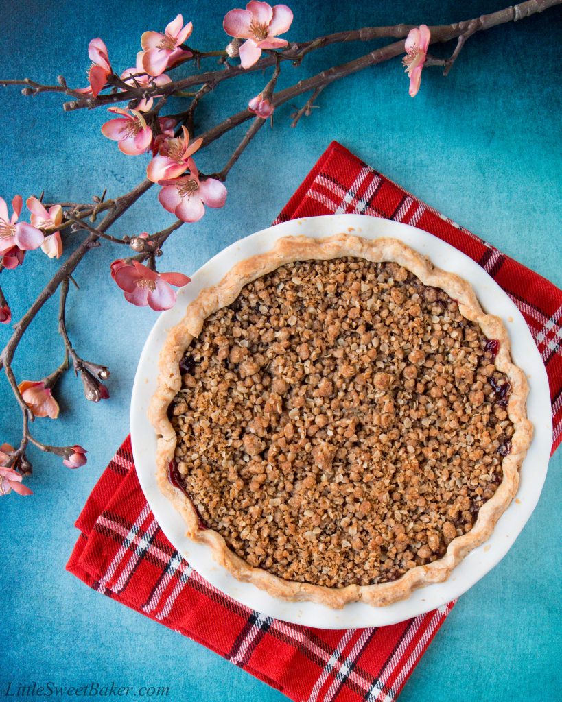 Enjoy this fabulous cherry pie all year round by using fresh, frozen or even jarred cherries with this easy and adaptable recipe. It's the best homemade cherry pie filling topped with a crunchy streusel topping and wrapped in a flaky pie crust. Cherry pie | sour cherry pie | best cherry pie | easy cherry pie | fresh cherry pie | cherry pie using frozen cherries