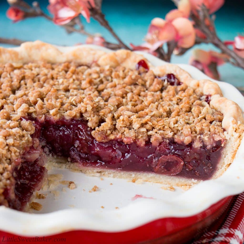 Enjoy this fabulous cherry pie all year round by using fresh, frozen or even jarred cherries with this easy and adaptable recipe. It's the best homemade cherry pie filling topped with a crunchy streusel topping and wrapped in a flaky pie crust. Cherry pie | sour cherry pie | best cherry pie | easy cherry pie | fresh cherry pie | cherry pie using frozen cherries