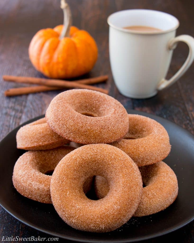 These baked pumpkin donuts are super soft and moist with a delightful pumpkin taste and crunchy cinnamon-sugar coating. (pumpkin donuts, pumpkin spice donuts, baked pumpkin donuts, homemade pumpkin donuts, Tim Hortons, pumpkin cake donuts)
