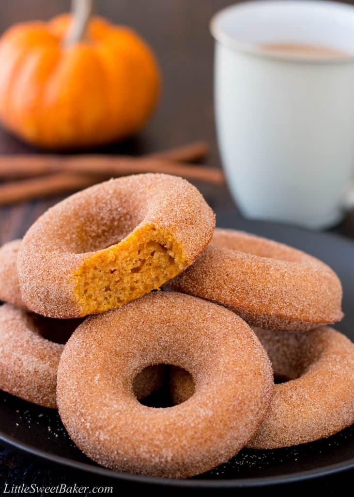 These baked pumpkin donuts are super soft and moist with a delightful pumpkin taste and crunchy cinnamon-sugar coating. (pumpkin donuts, pumpkin spice donuts, baked pumpkin donuts, homemade pumpkin donuts, Tim Hortons, pumpkin cake donuts)