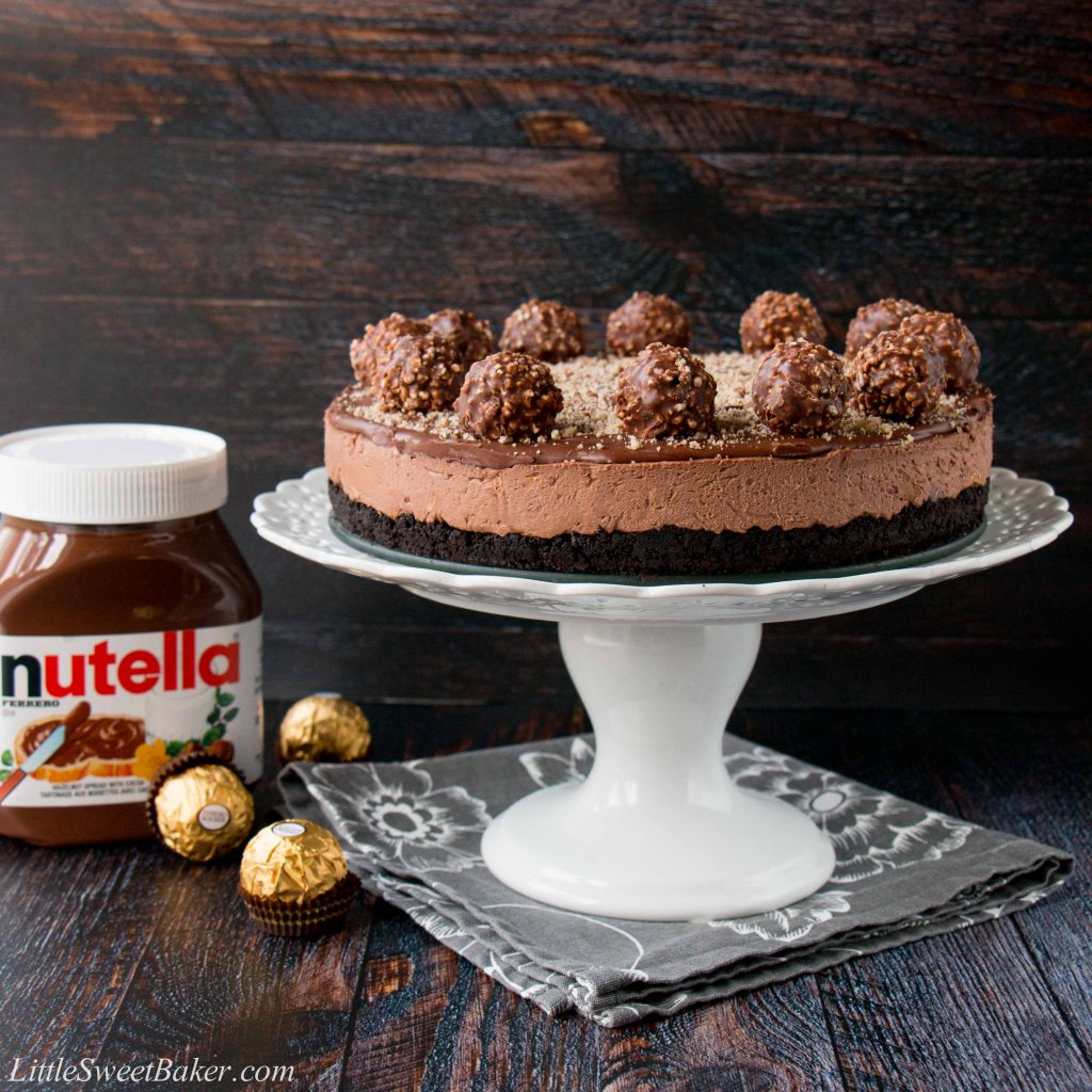 Oreo cookie crust with a Nutella cheesecake filling, topped with more Nutella and decorated with Ferrero Rocher candies. This no-bake recipe is the easiest and most delicious Nutella cheesecake you will ever make!