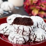 These fudgy chocolate crinkle cookies are rich and chewy like brownie bites rolled in powdered sugar. #chocolatecrinklecookies #browniecookies #Christmascookie #crinklecookies