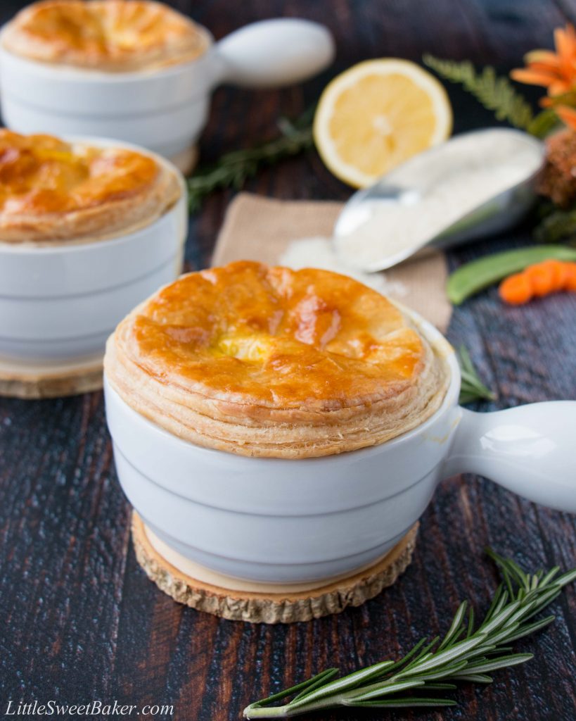 These mini chicken pot pies are topped with a flaky puff pastry and filled with rice, veggies and chicken in a creamy lemon sauce. #chickenpotpie #minichickenpotpies #chickenandrice #ReachForRice #Ad #usaricecan