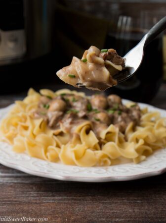 This easy one-pot meal features succulent chunks of beef in a creamy mushroom sauce. Cooking the beef in the Instant Pot makes it so tender and creates the most flavorful sauce you can imagine. #beefstroganoff #instantpotrecipe