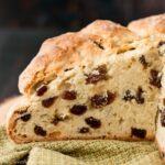 Made in under an hour from start to finish; this bakery quality bread is soft, moist and chewy with a wonderful crusty exterior. #Irishsodabread #raisinbread #easybreadrecipe