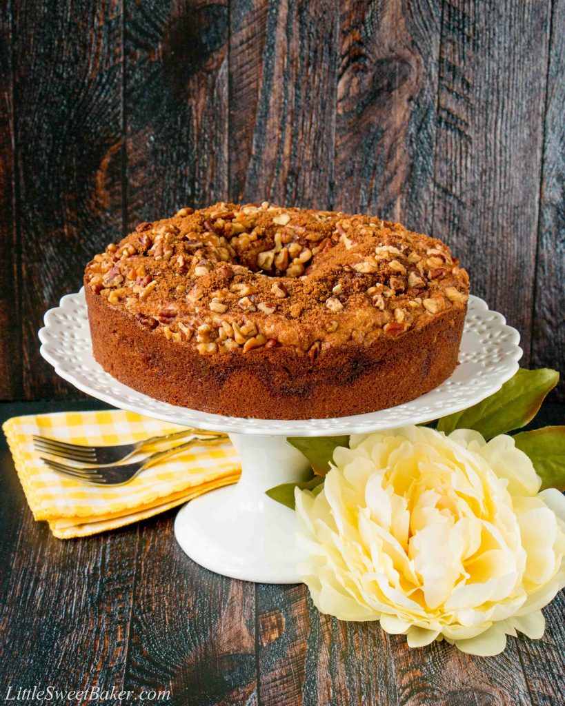 This soft, moist and tender coffee cake with its layers of cinnamon and brown sugar streusel is guaranteed to be your most requested dessert. #coffeecake #sourcreamcoffeecake #cinnamoncoffeecake #walnutcoffeecake