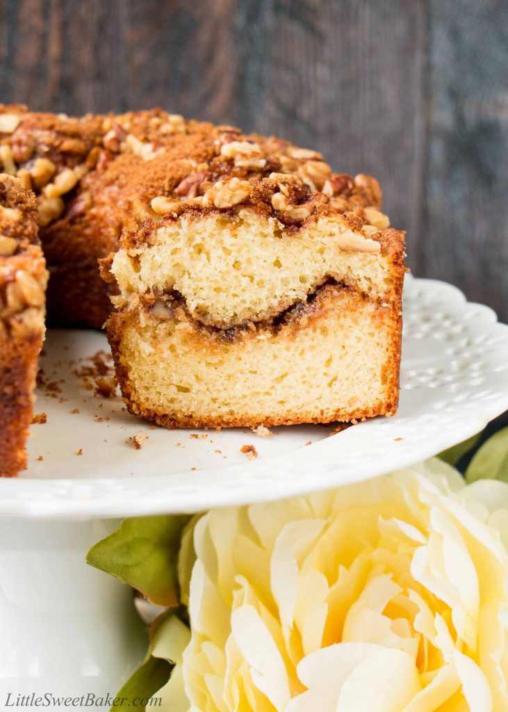 This soft, moist and tender coffee cake with its layers of cinnamon and brown sugar streusel is guaranteed to be your most requested dessert. #coffeecake #sourcreamcoffeecake #cinnamoncoffeecake #walnutcoffeecake