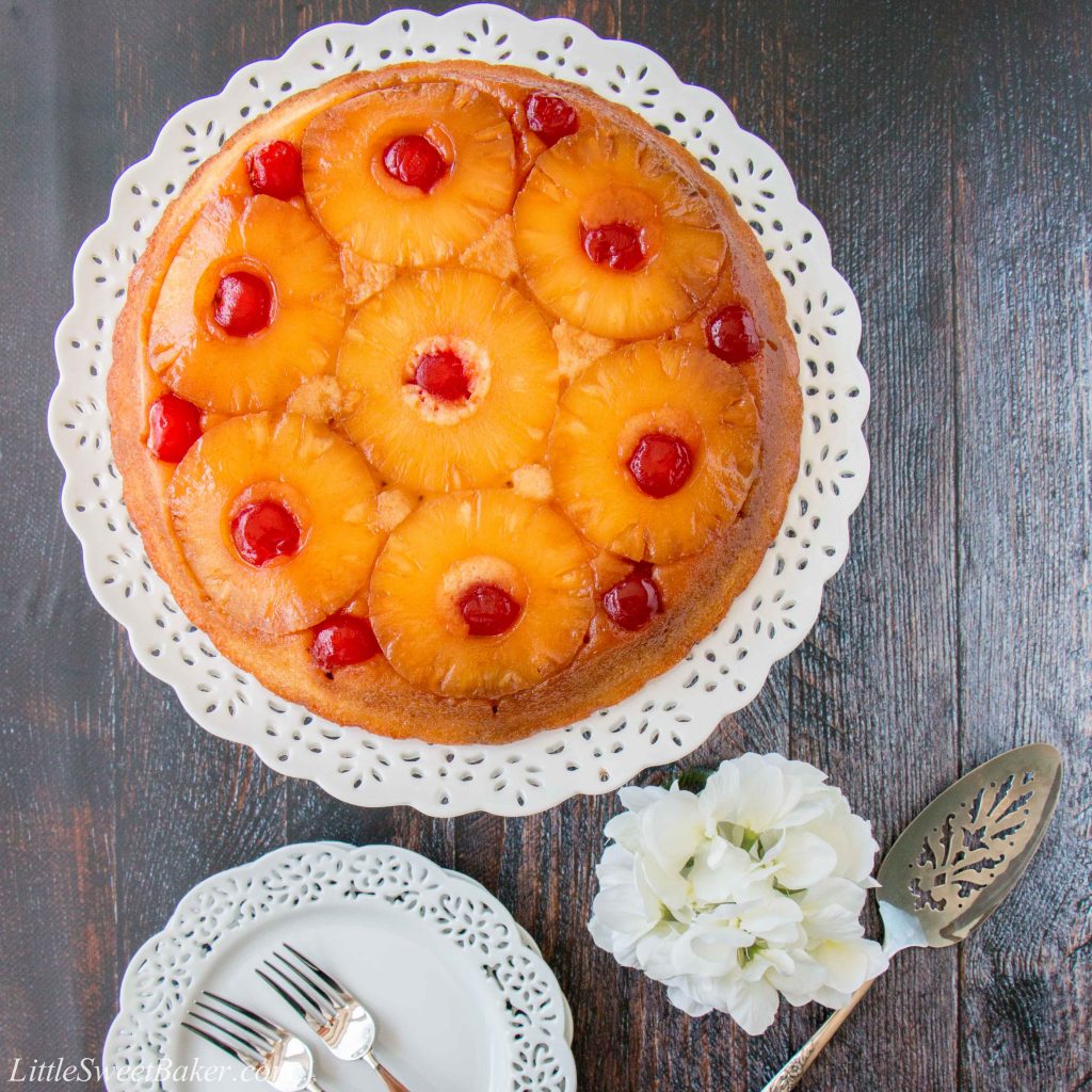 Sweet-juicy caramelized pineapple slices baked underneath a soft, rich and buttery cake, turned upside down to reveal a gorgeous presentation! #pineappleupsidedowncake #upsidedowncake #pineapplecake #buttercake