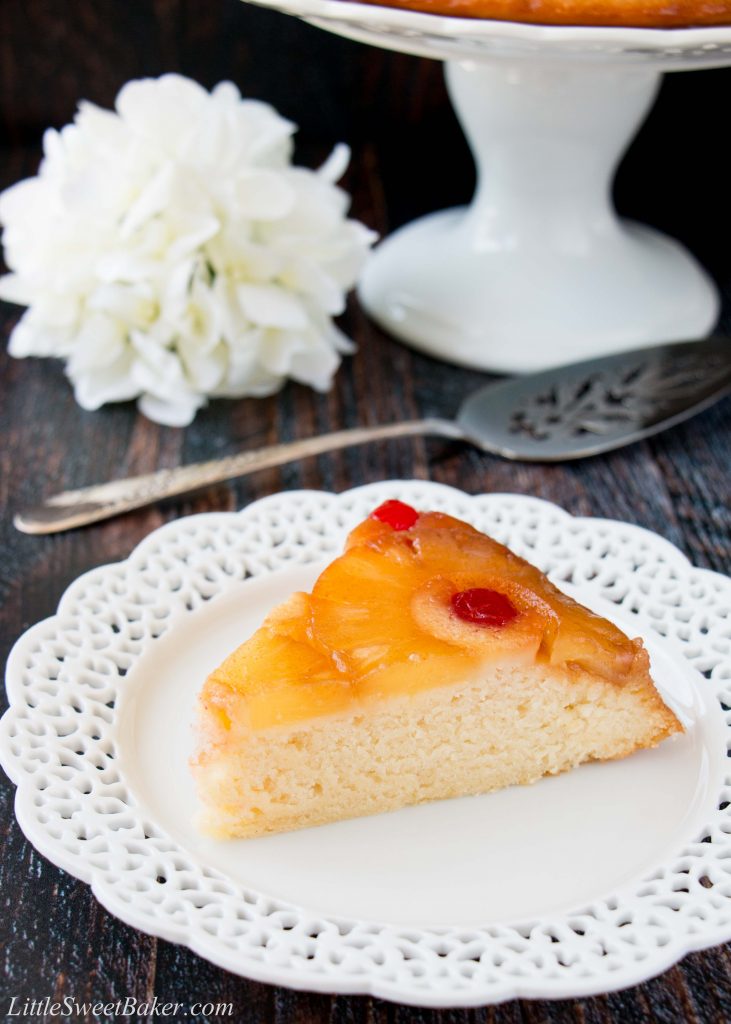 Sweet-juicy caramelized pineapple slices baked underneath a soft, rich and buttery cake, turned upside down to reveal a gorgeous presentation! #pineappleupsidedowncake #upsidedowncake #pineapplecake #buttercake