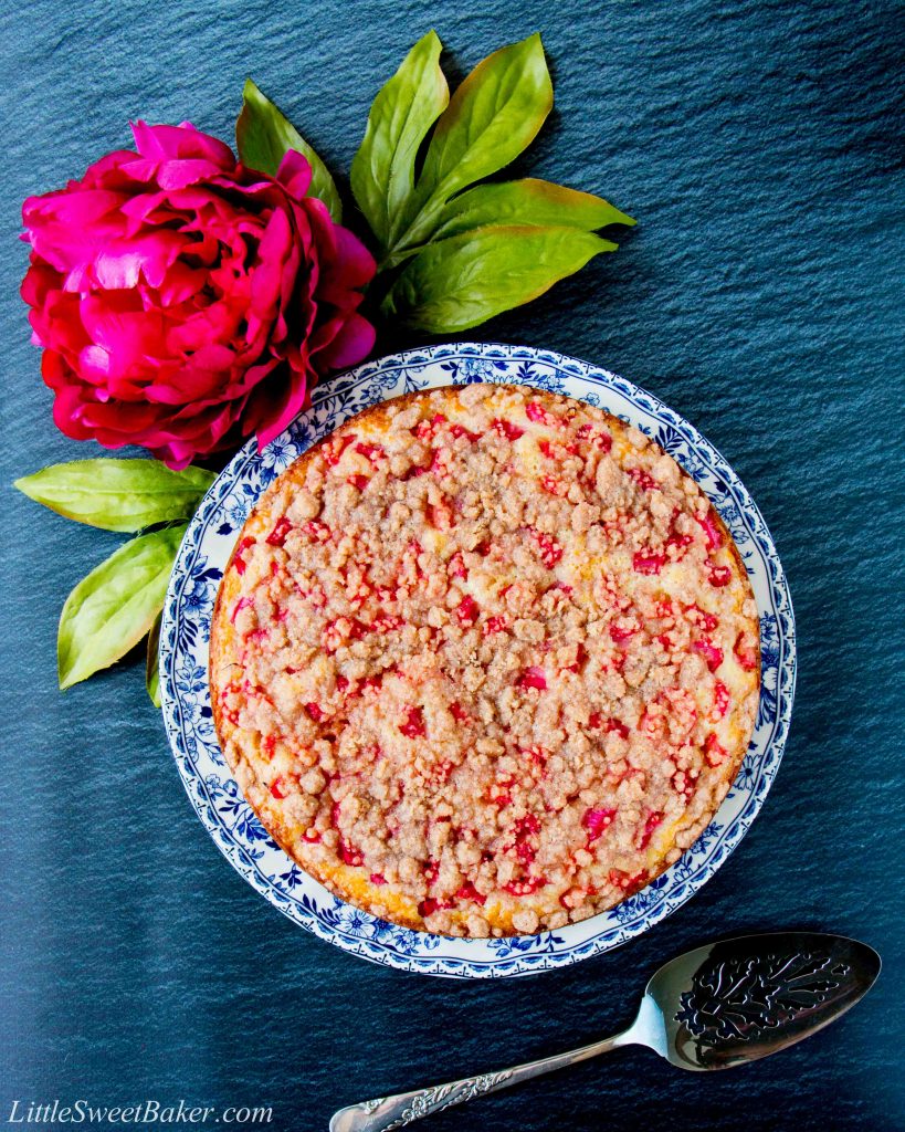 This is a tender and moist sour cream coffee cake topped with gorgeous chunks of rhubarb and a sweet-cinnamon streusel. #rhubarbcake #coffeecake #cinnamonstreusel