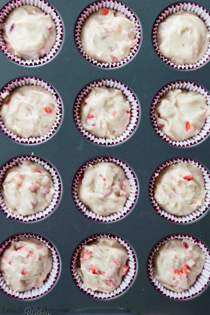 These fresh strawberry cupcakes are made from scratch with real strawberries and topped with a creamy strawberry buttercream. They are incredibly fluffy and moist, and full of fresh fruit flavor. #strawberrycupcakes #homemade #fresh #strawberrybuttercream