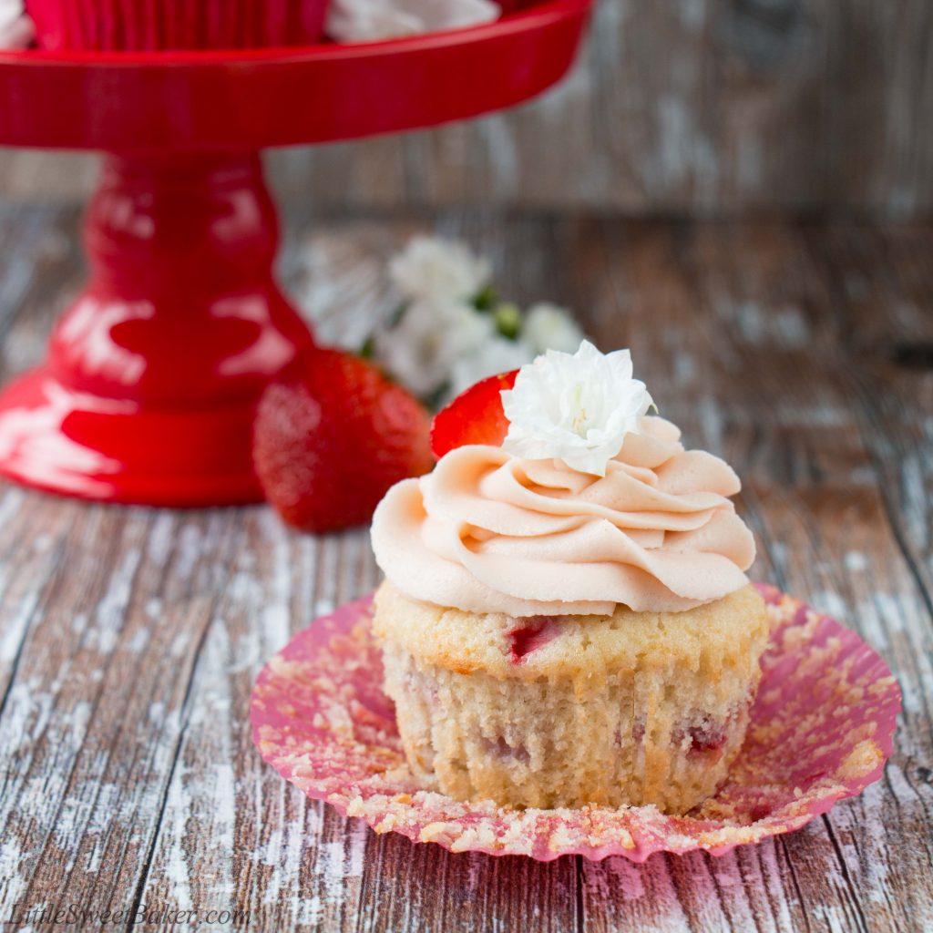 These fresh strawberry cupcakes are made from scratch with real strawberries and topped with a creamy strawberry buttercream. They are incredibly fluffy and moist, and full of fresh fruit flavor. #strawberrycupcakes #homemade #fresh #strawberrybuttercream