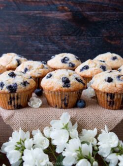 These sugar-crusted muffins are bursting with blueberries. They are incredibly soft and moist on the inside with a crispy-golden exterior. #blueberrymuffins #bestblueberrymuffins #easyblueberrymuffins