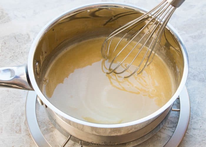 a simple bourbon butter sauce in a saucepan
