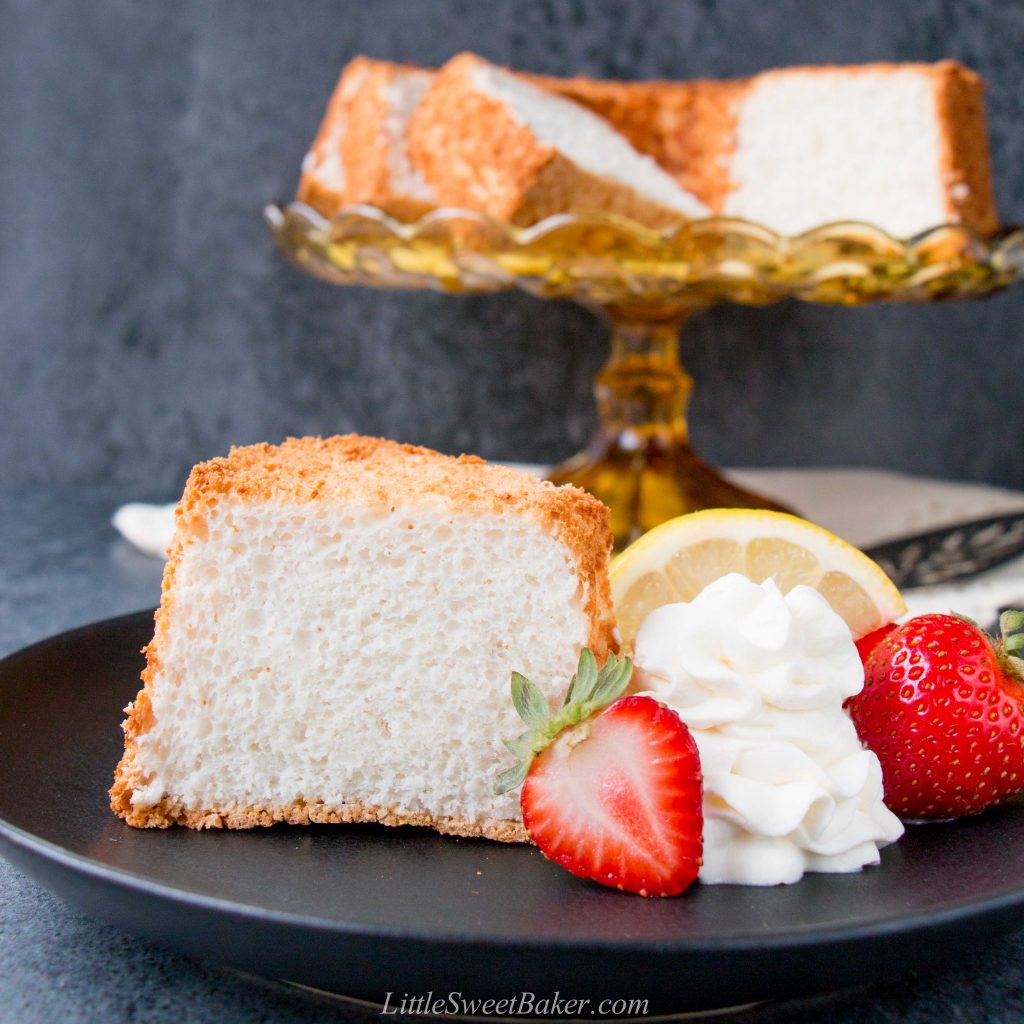 This moist, soft and fluffy angel food cake is a perfect summer dessert. It's light as air and is essentially fat-free! #angelfoodcake #easyangelfoodcake #angelfoodcakerecipe