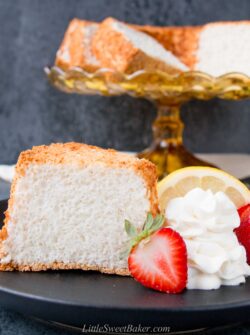 This moist, soft and fluffy angel food cake is a perfect summer dessert. It's light as air and is essentially fat-free! #angelfoodcake #easyangelfoodcake #angelfoodcakerecipe