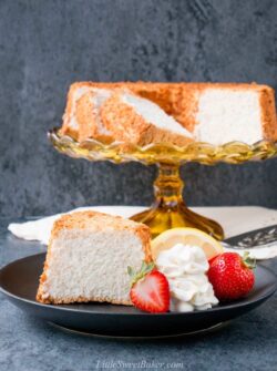 This moist, soft and fluffy angel food cake is a perfect summer dessert. It's light as air and is essentially fat-free! #angelfoodcake #easyangelfoodcake #angelfoodcakerecipe