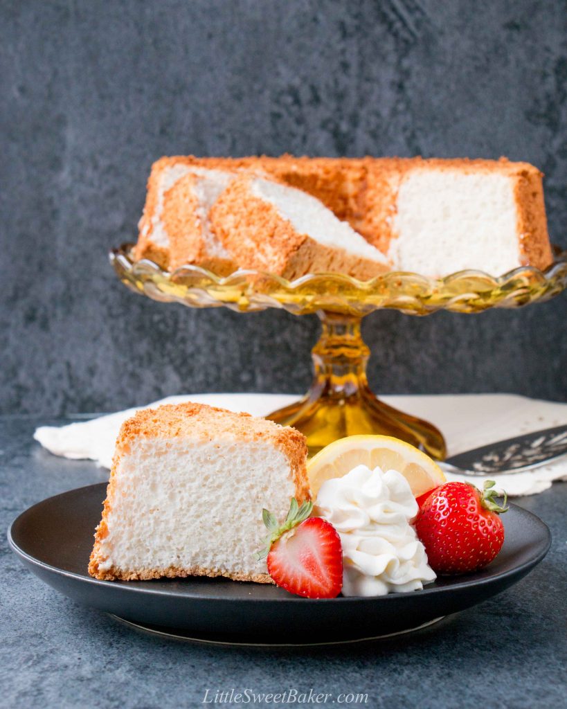 This moist, soft and fluffy angel food cake is a perfect summer dessert. It's light as air and is essentially fat-free! #angelfoodcake #easyangelfoodcake #angelfoodcakerecipe