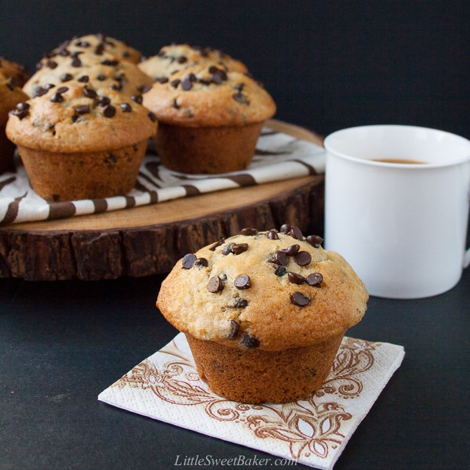 The BEST chocolate chip muffin recipe - soft, moist and fluffy, loaded with chocolate chips and a perfect crispy sky-high muffin top! Hundreds of rave review. #chocolatechipmuffins #easychocolatechipmuffins #bestchocolatechipmuffins #moistchocolatechipmuffins