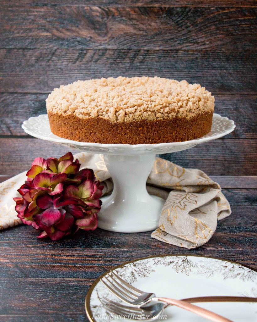 A streusel topped moist coffee cake flavored with pumpkin and fall spices. #pumpkincake #pumpkinspicecake #pumpkincoffeecake