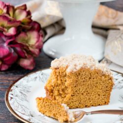 A streusel topped moist coffee cake flavored with pumpkin and fall spices. #pumpkincake #pumpkinspicecake #pumpkincoffeecake
