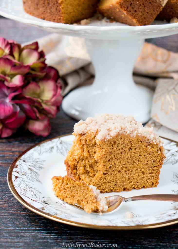 A streusel topped moist coffee cake flavored with pumpkin and fall spices. #pumpkincake #pumpkinspicecake #pumpkincoffeecake