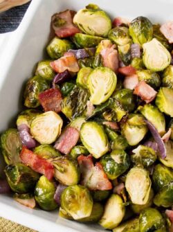 This easy one-pan roasted brussel sprouts is a perfect side dish to any meal. The bacon adds a smokey flavor to the crispy and sweet caramelized brussel sprouts. #roastedbrusselsprouts #Thanksgivingside #Thanksgivingrecipe